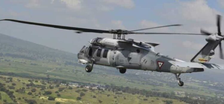 Con helicóptero artillado, militares repelen agresión a tiros en Michoacán Con helicóptero artillado, militares repelen agresión a tiros en Michoacán