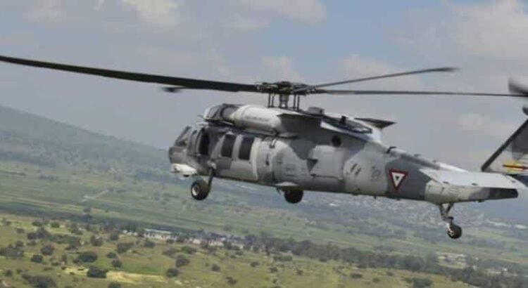 Con helicóptero artillado, militares repelen agresión a tiros en Michoacán